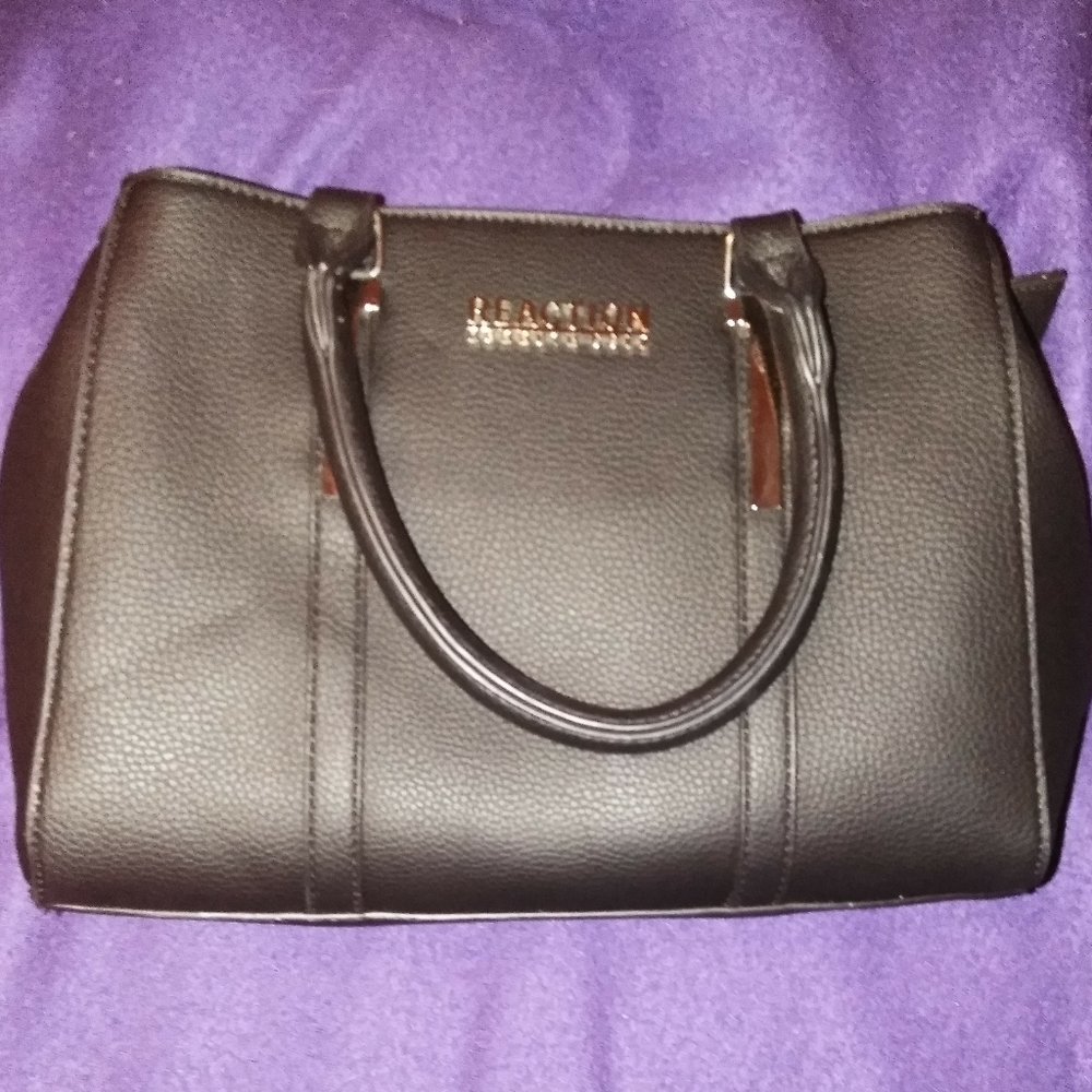 Kenneth Cole black purse with a shoulder strap